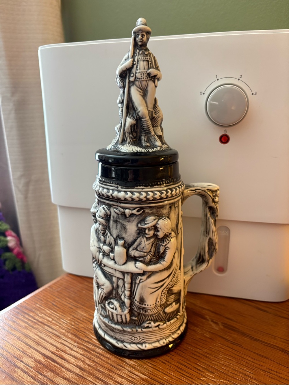 Vintage Black and Cream Ceramic Relief Stein with Figural Lid